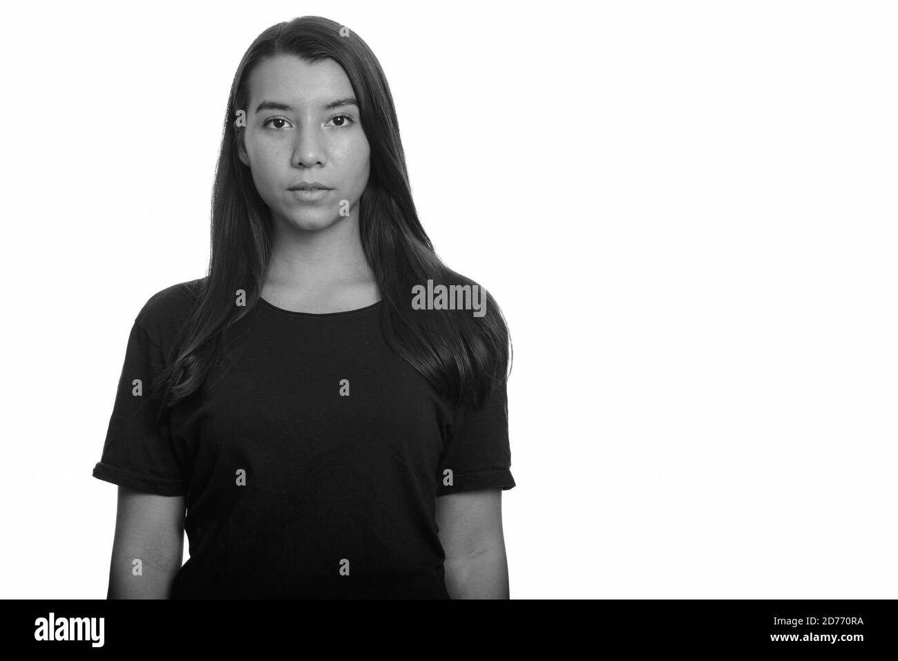 Portrait of young beautiful woman looking at camera Stock Photo - Alamy