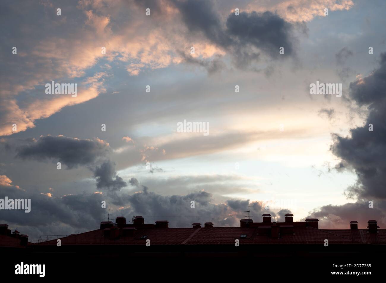 Beautiful sky with clouds lit by the setting sun Stock Photo - Alamy