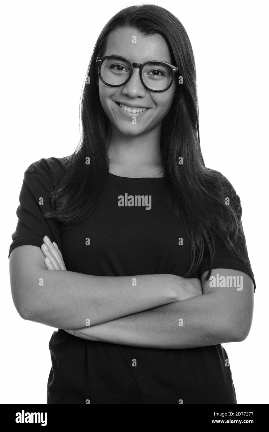 Young happy Caucasian woman smiling with arms crossed Stock Photo - Alamy