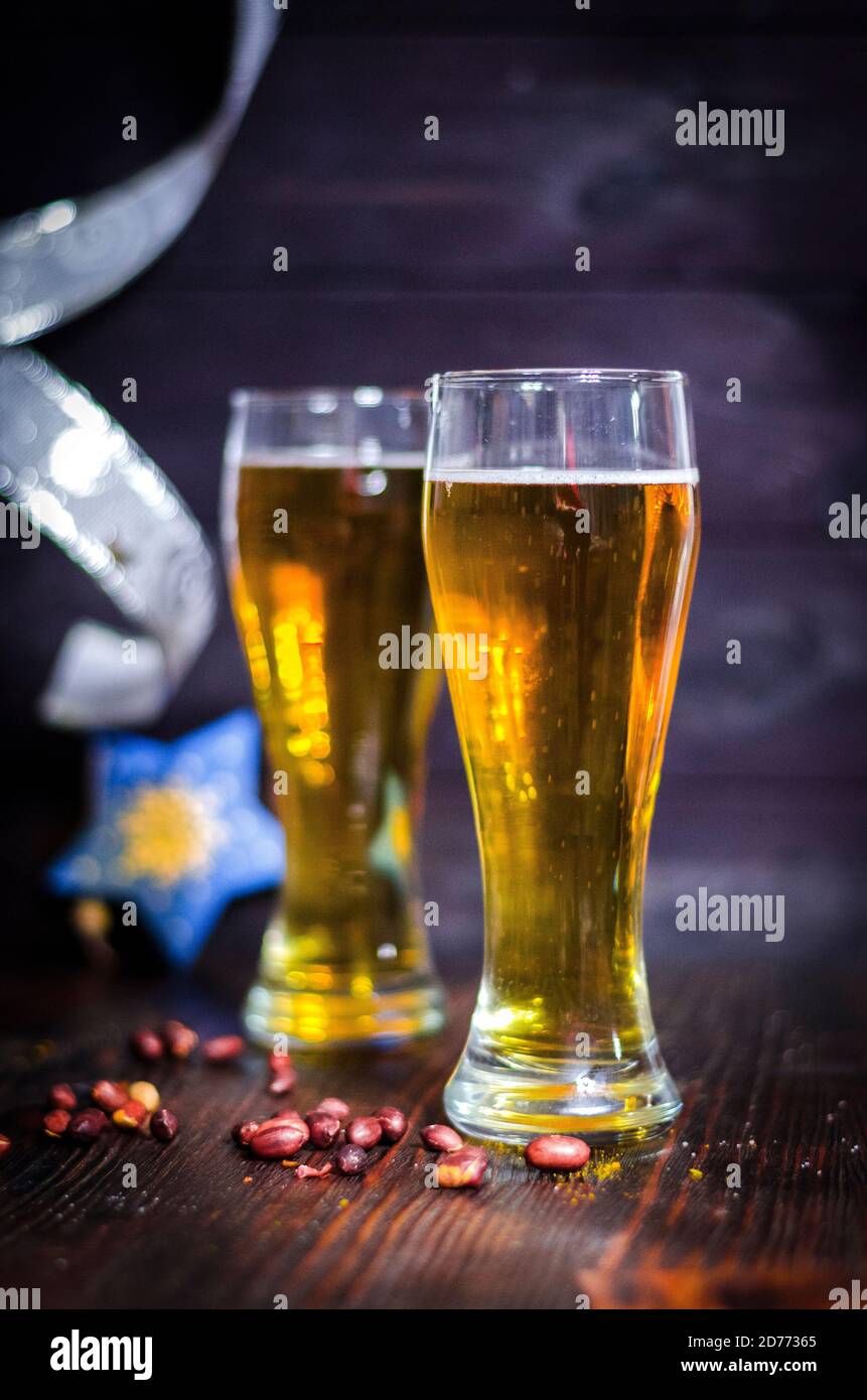 Beer light in glasses on a Christmas background Stock Photo