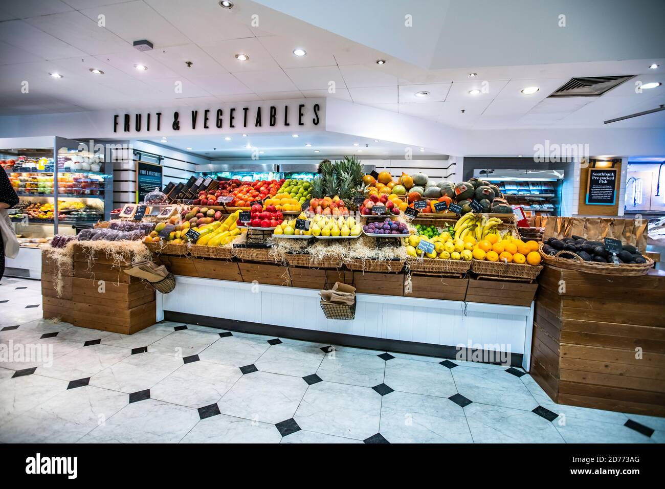 Selfridges food hall London, UK, September 20, 2019: inside a Selfridges food hall in London uk. Posh supermarket grocery with fresh vegetables and fr Stock Photo