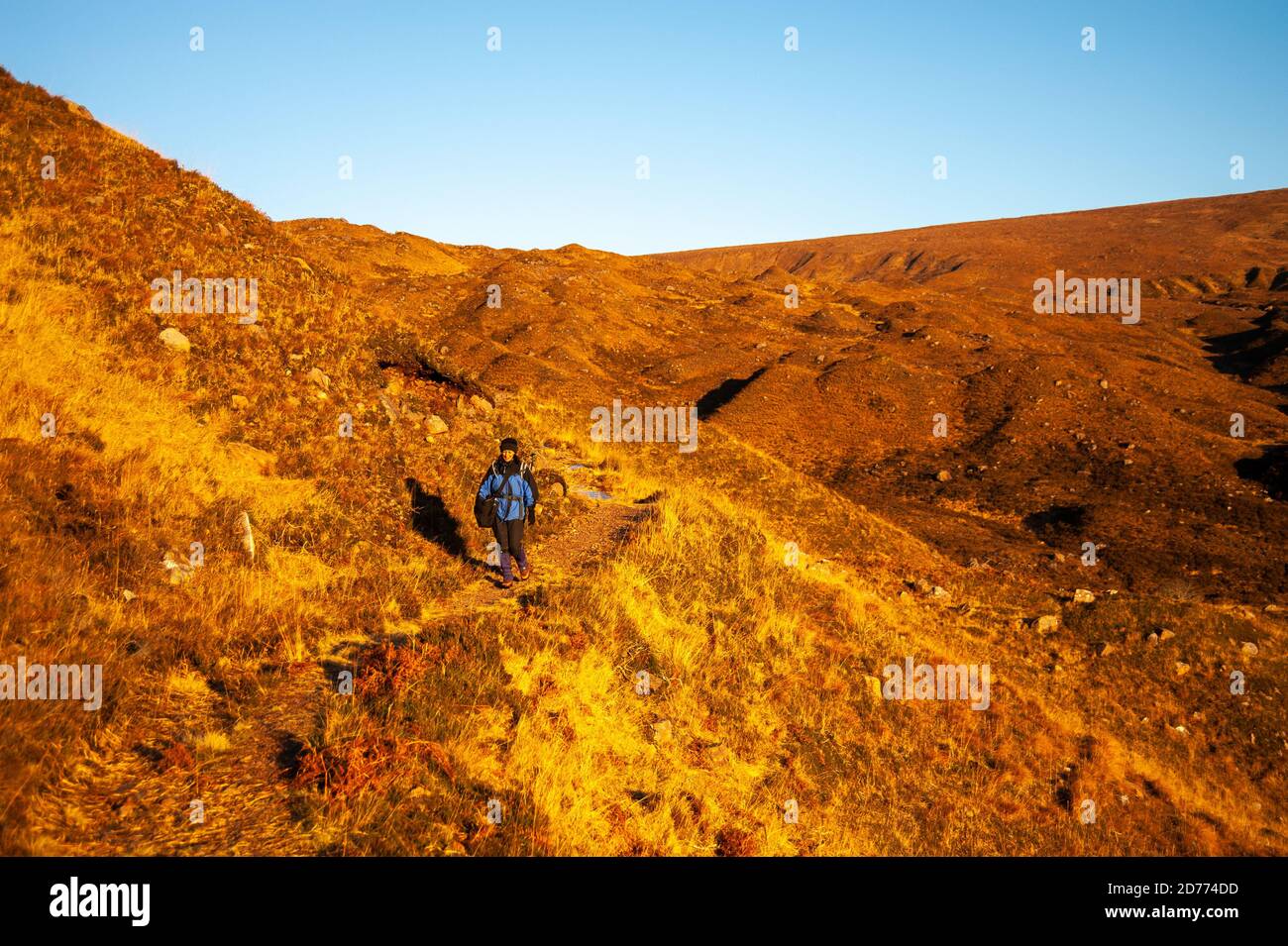 Hillwalkers on the hills of the Applecross Estate, Applecross, Wester Ross, Scotland. Stock Photo