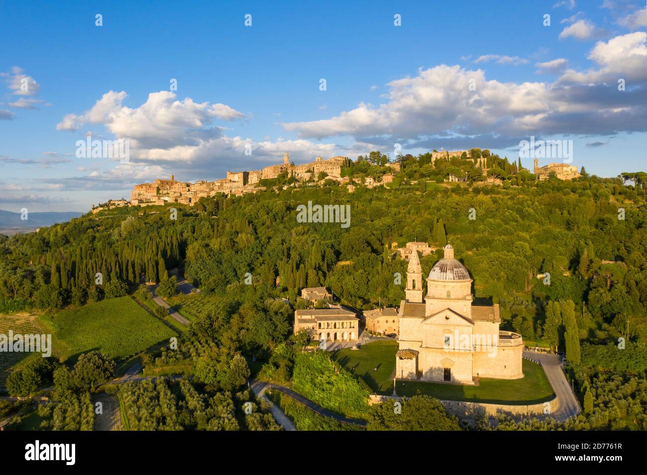 The church Chiesa di San Biagio beneath the hilltop town of ...