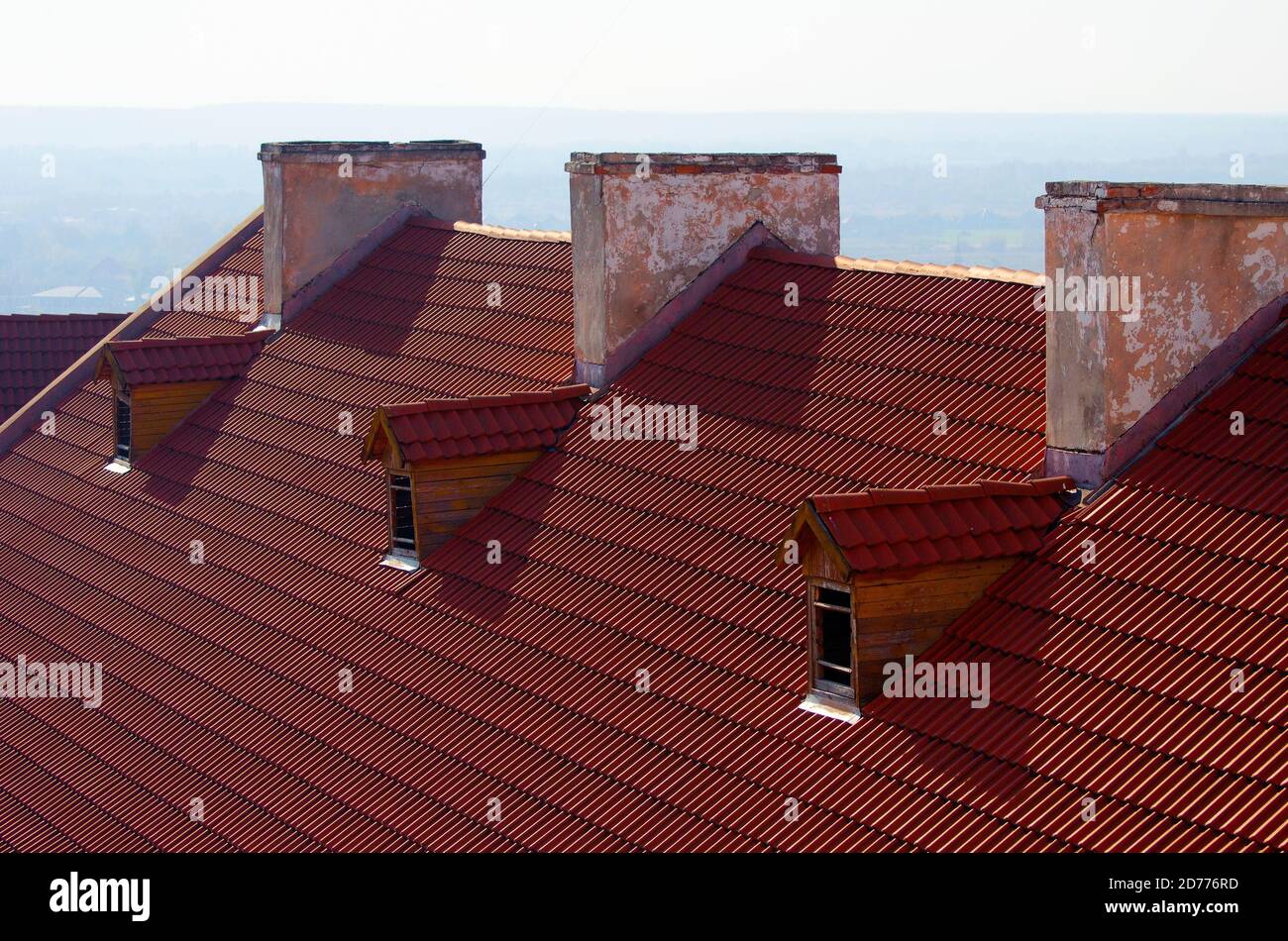 Red brick chimney on the roof of the house Stock Photo - Alamy
