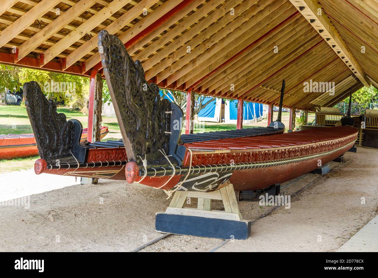 Two Maori ceremonial war canoes undercover at the Waitangi Museum, North Island, New Zealand. Stock Photo