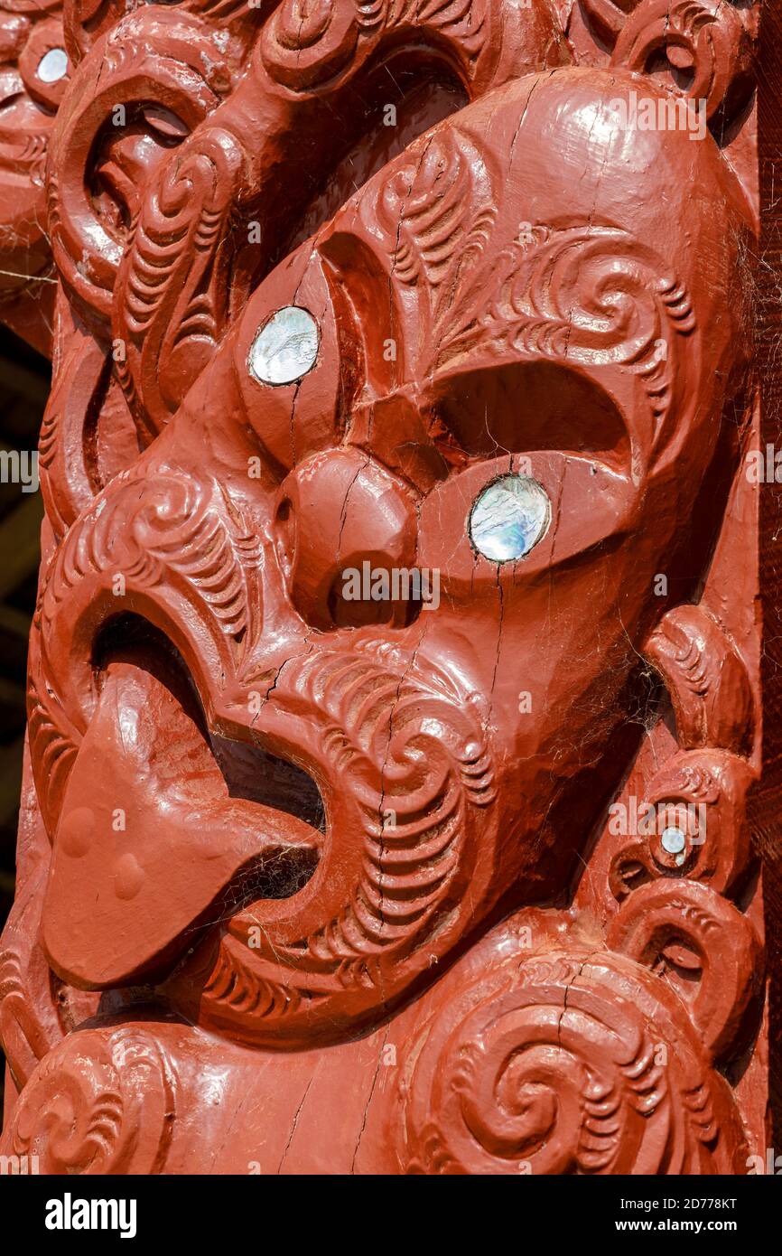 Maori wood carving on the ceremonial war canoe building at Waitangi, North Island, New Zealand. Stock Photo