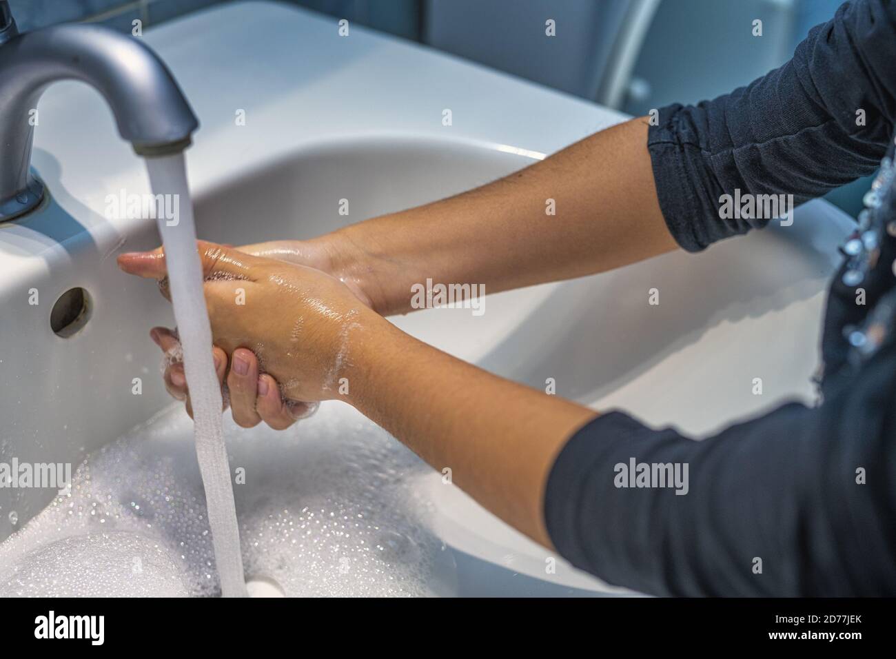 Washing hands in covid-19 times. Stock Photo