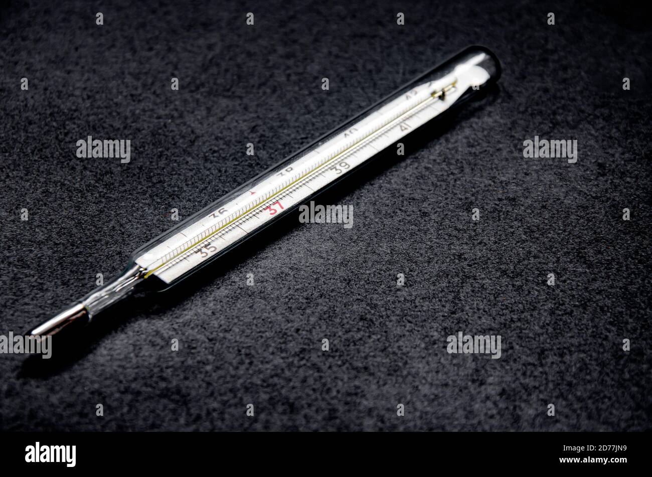 Old mercury thermometer to measure body temperature during illness