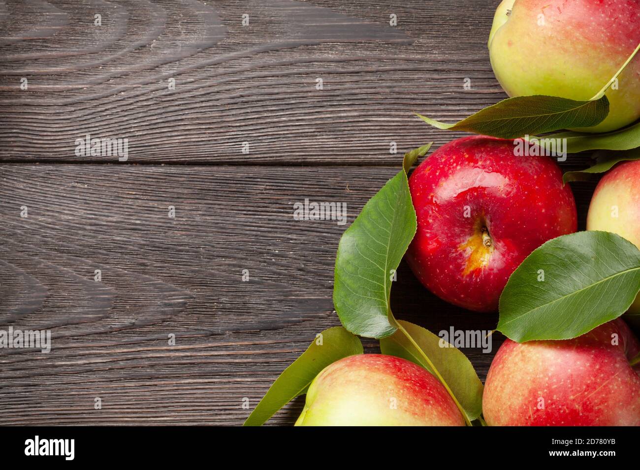 Ripe garden apple fruits on wooden table. Top view flat lay with copy space Stock Photo
