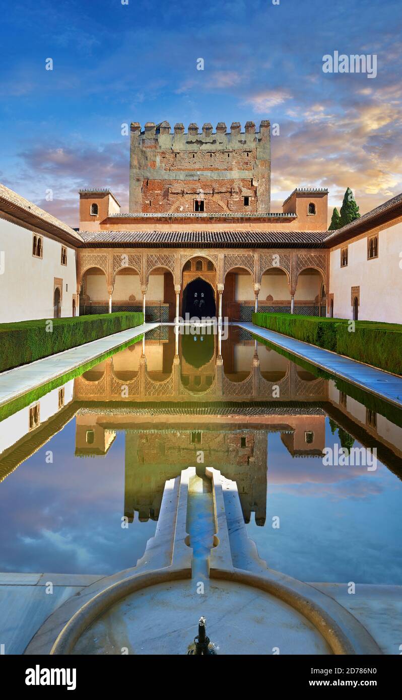 Arabesque Moorish architecture and pond of the  Court of the Myrtles  of the Palacios Nazaries,  Alhambra. Granada, Andalusia, Spain. Stock Photo