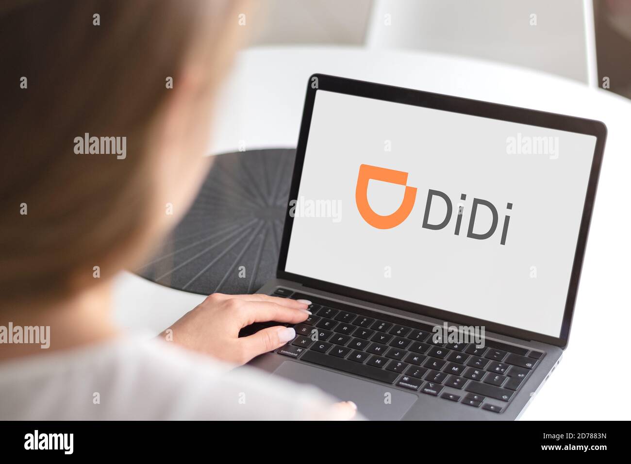 Guilherand-Granges, France - October 21, 2020. Notebook with DiDi Chuxing logo. Chinese vehicle for hire company. Stock Photo