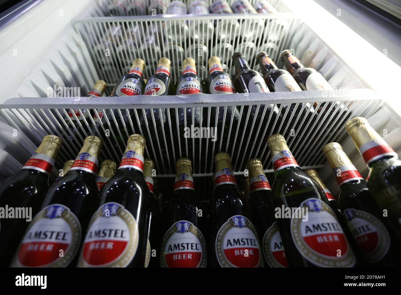 Amstel beer bottles are seen displayed, amid the outbreak of the  coronavirus disease (COVID-19), at a liquor store in Amman, Jordan, October  21, 2020. REUTERS/Muhammad Hamed Stock Photo - Alamy