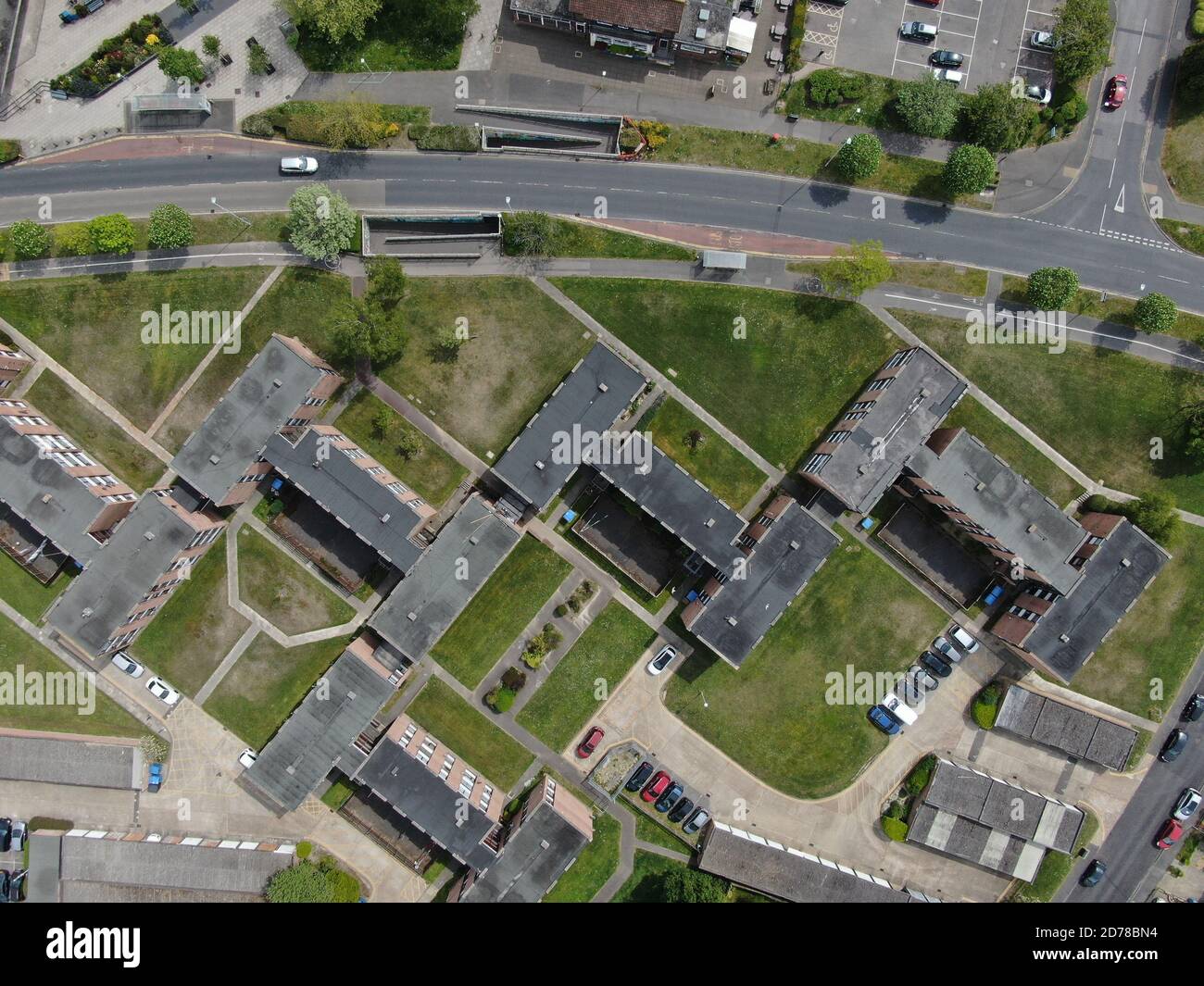 aerial view of H shaped flats and a road with bus stops  Stock Photo