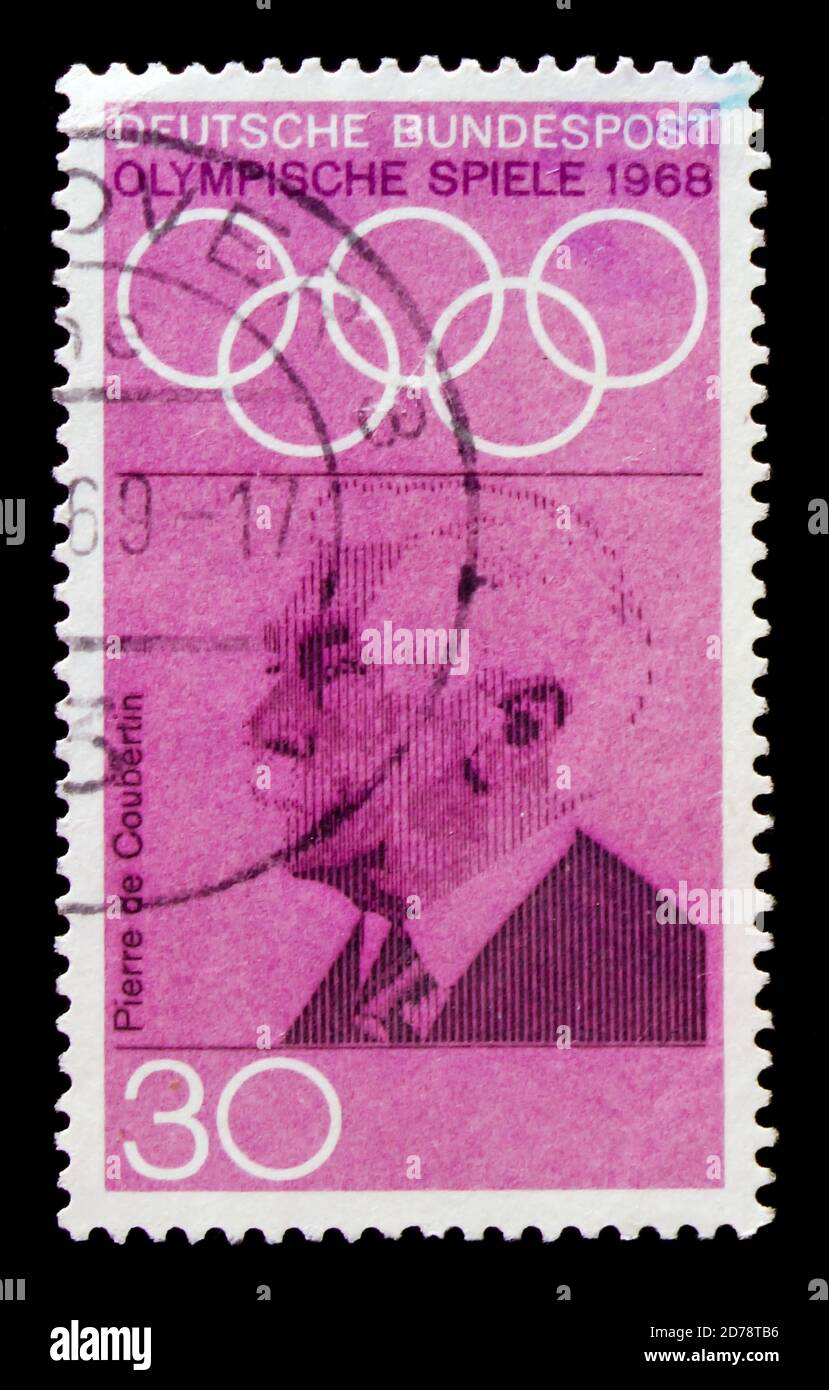 MOSCOW, RUSSIA - OCTOBER 21, 2017: A stamp printed in Germany Federal Republic shows Baron Pierre de Coubertin (1862-1937), Summer Olympics 1968, Mexi Stock Photo