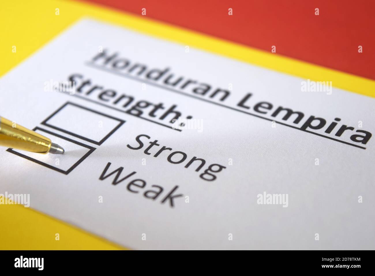 One person is answering question about strength of Honduran Lempira currency. Stock Photo