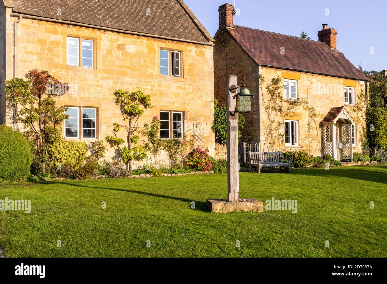 Evening light on traditional stone cottages in the Cotswold village of Stanton, Gloucestershire UK Stock Photo