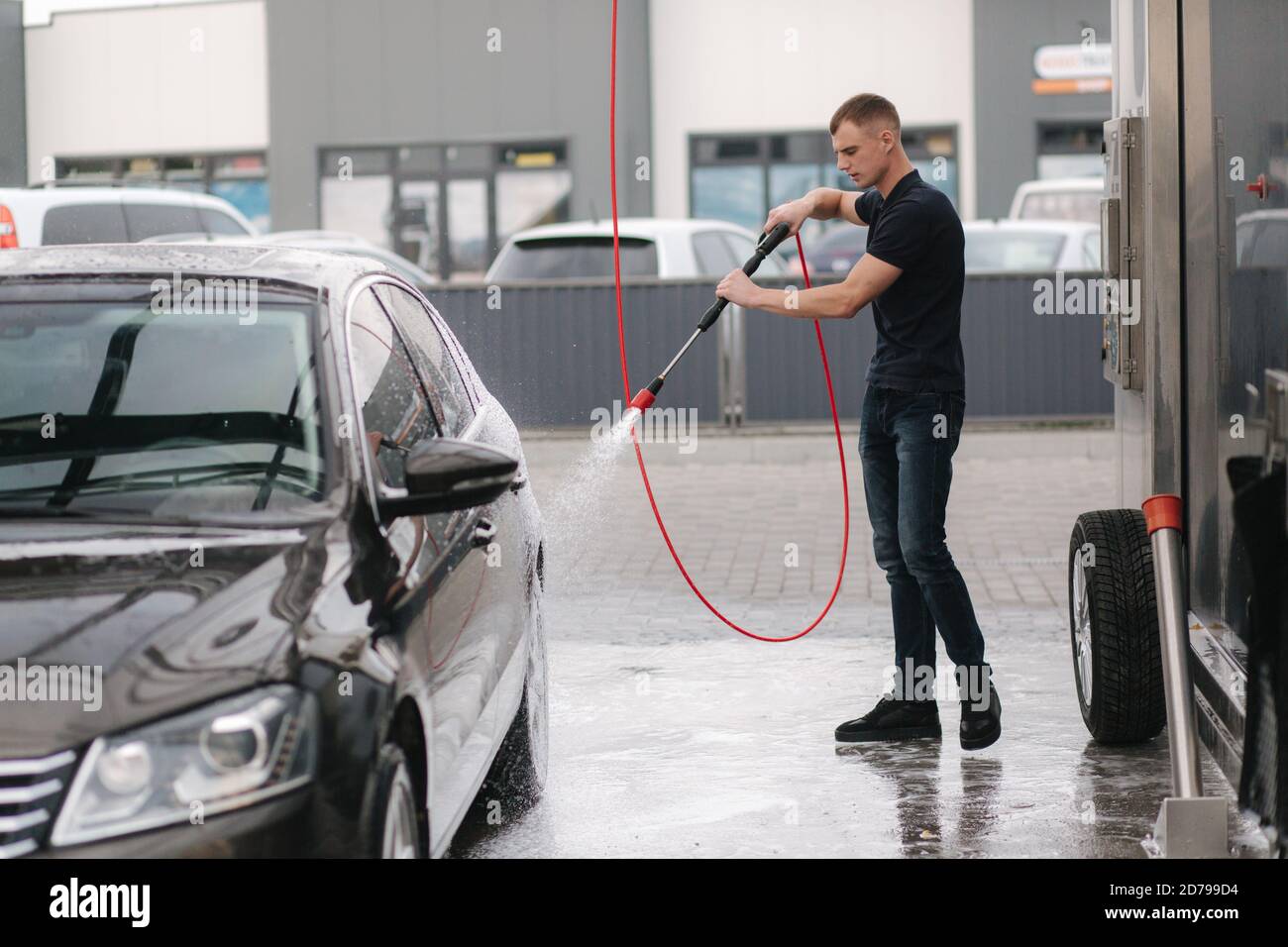 Washing car hose man hi-res stock photography and images - Alamy