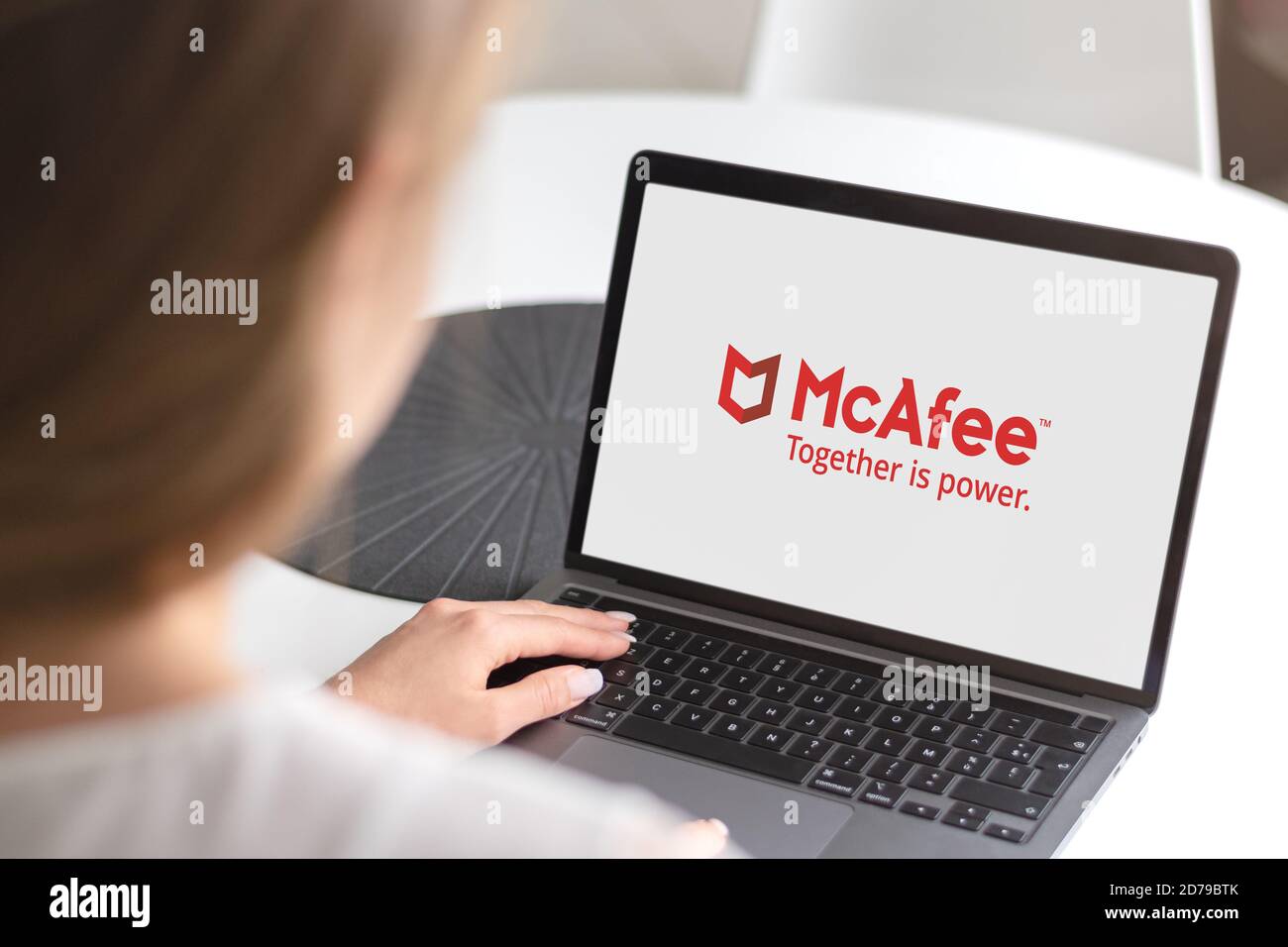 Guilherand-Granges, France - October 21, 2020. Notebook with McAfee logo. American global computer security software company. Stock Photo