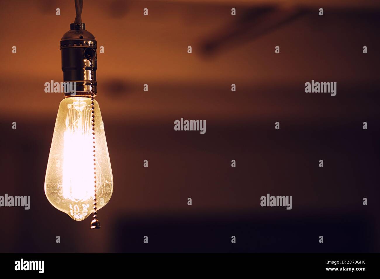 Lamps with tungsten filament. Edison's light bulb. Filament filament in