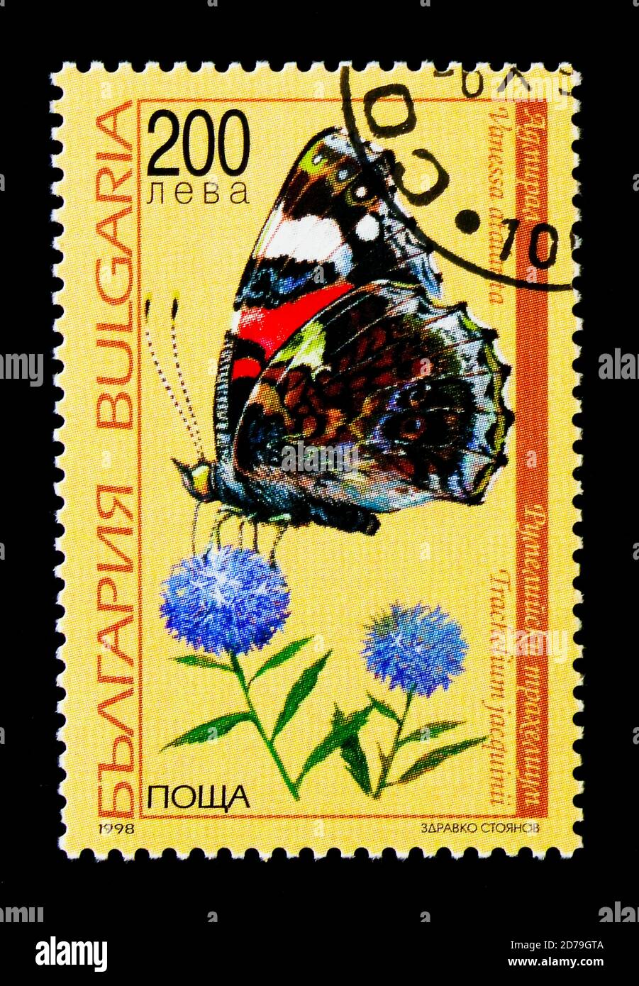 MOSCOW, RUSSIA - DECEMBER 21, 2017: A stamp printed in Bulgaria shows Red Admiral (Vanessa atalanta) butterfly and Trachelium jacquinii flower, Fauna Stock Photo