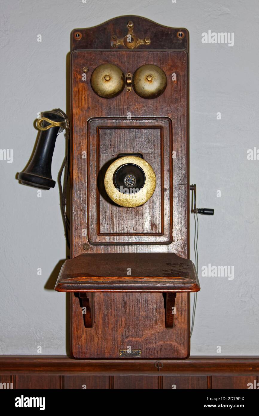 antique wall telephone, crank, crackled wood case, ear piece