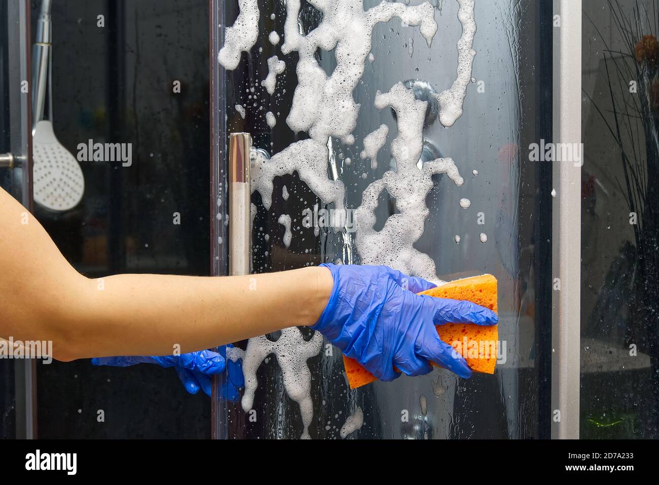 Cleaning of shower steam cabins from calcium deposits. Cleaning in the