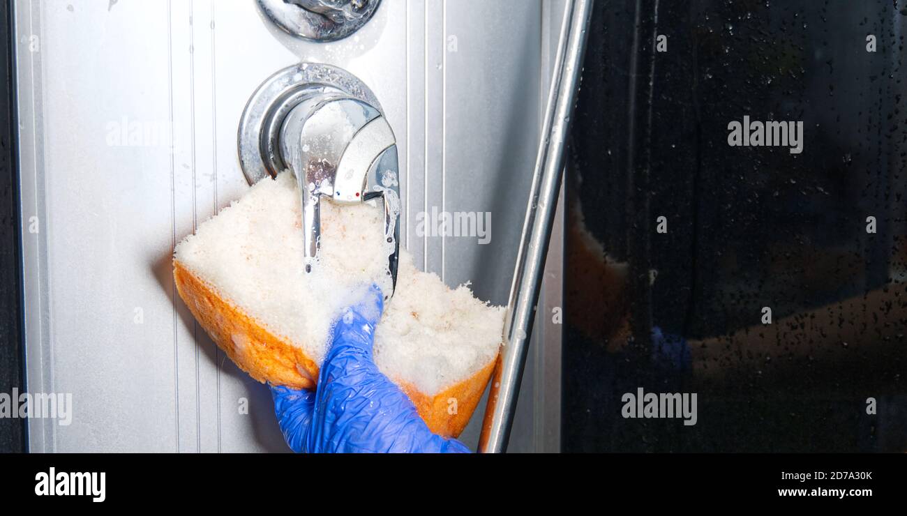 Cleaning of shower steam cabins from calcium deposits. Cleaning in the