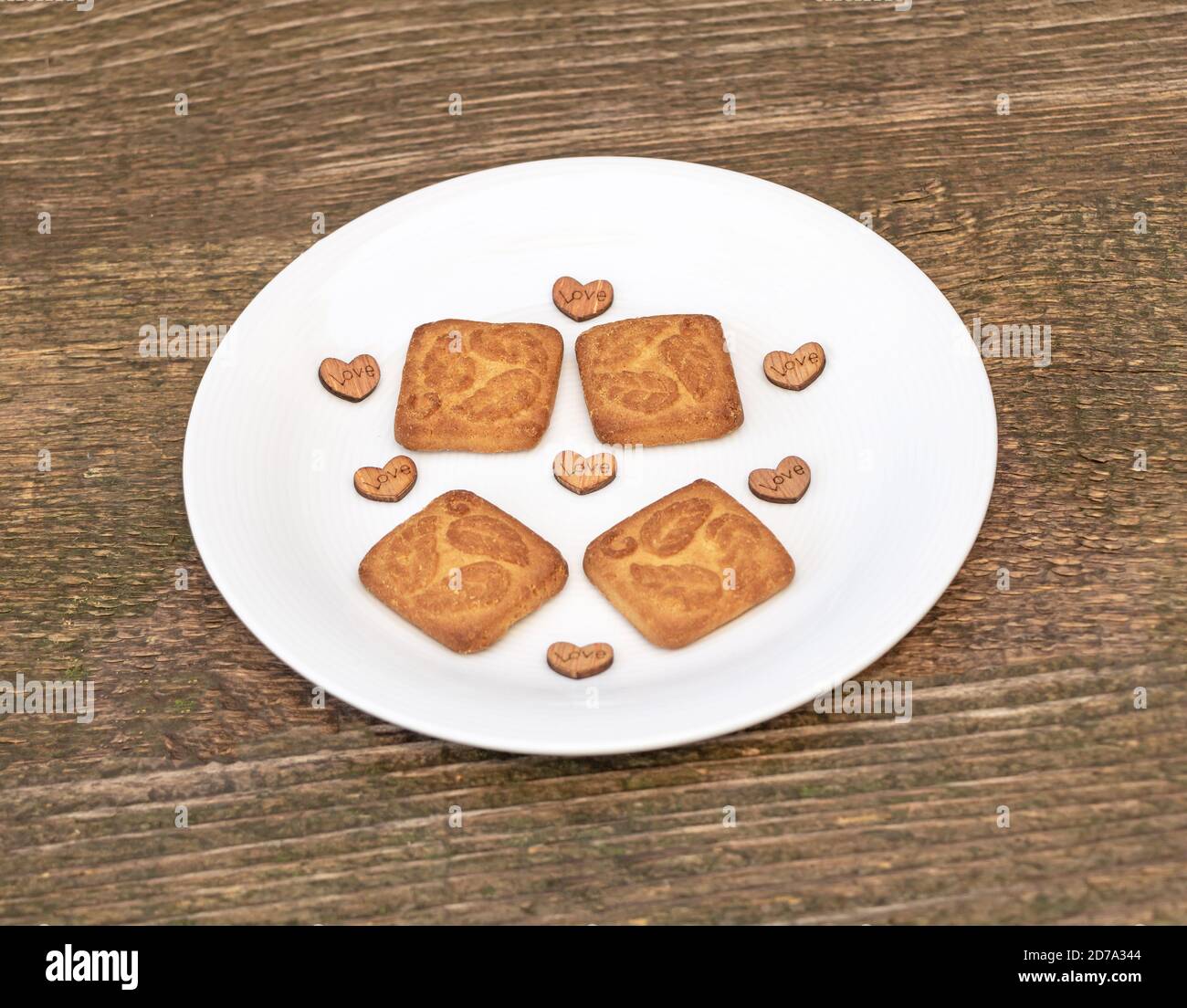 Delicious biscuits in a plate, Love theme concept Stock Photo