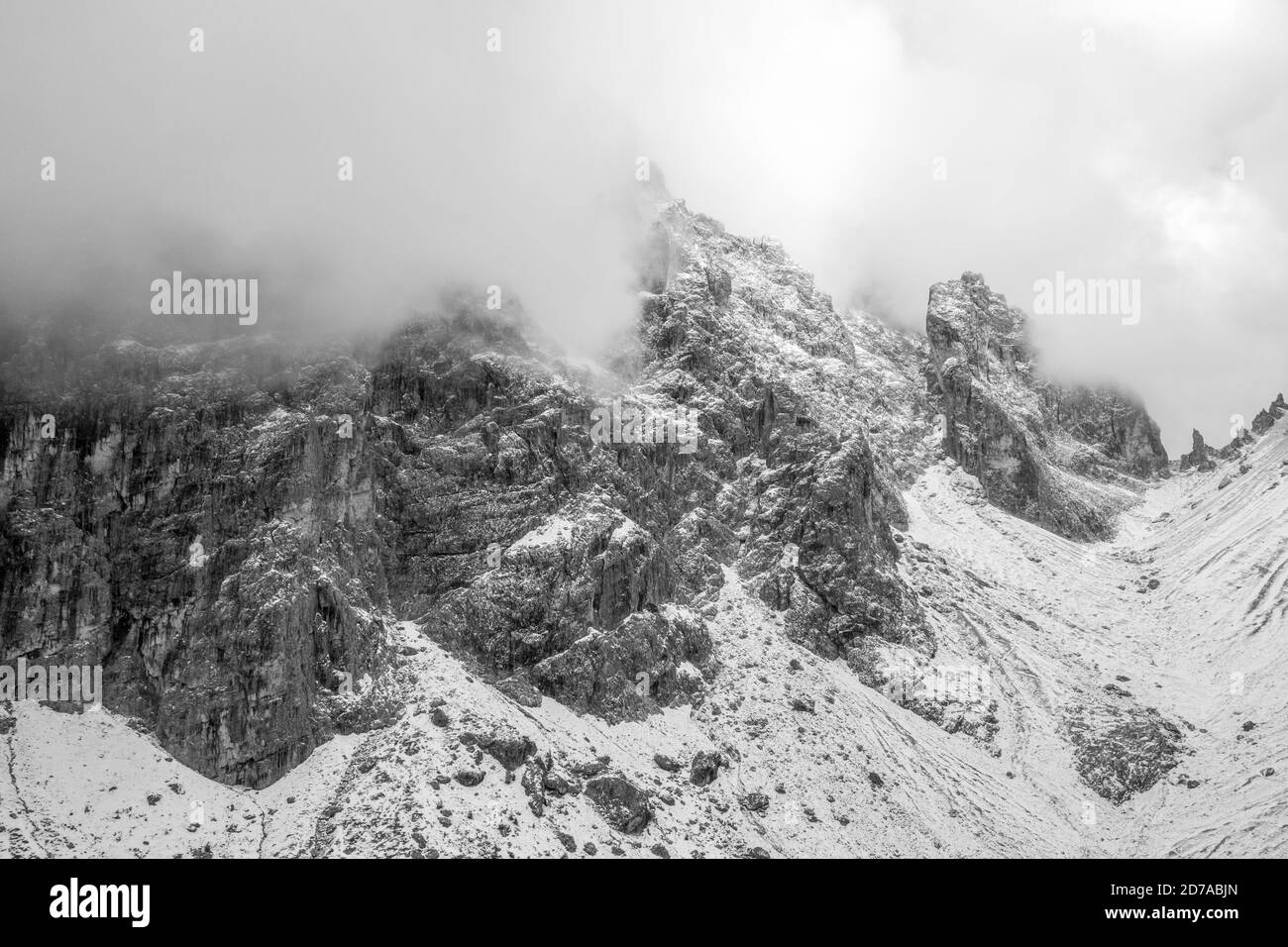 Dolomites covered in the snow and fog at daylight in Italy - great for ...