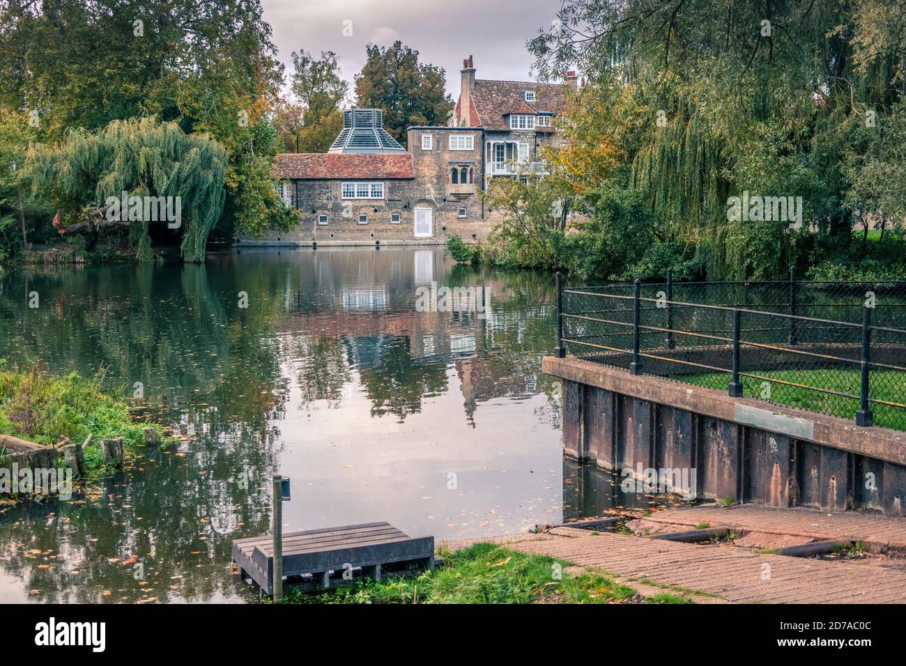 The Mill pond looking towards Darwin College Cambridge England Stock Photo