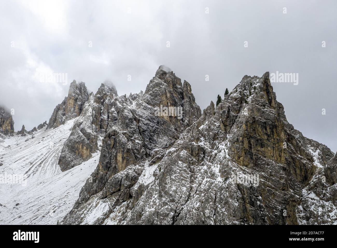 Dolomites covered in the snow and fog at daylight in Italy - perfect ...