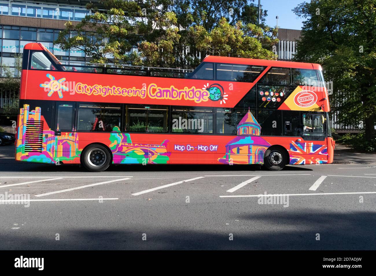 Hop on Hop off red city of Cambridge open topped sightseeing bus Stock Photo