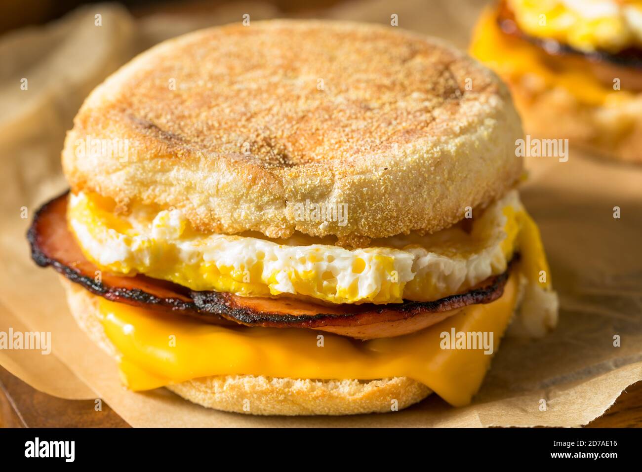 Homemade Egg English Muffin Sandwich with Bacon and Cheese Stock Photo