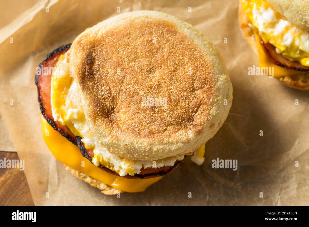 Homemade Egg English Muffin Sandwich with Bacon and Cheese Stock Photo