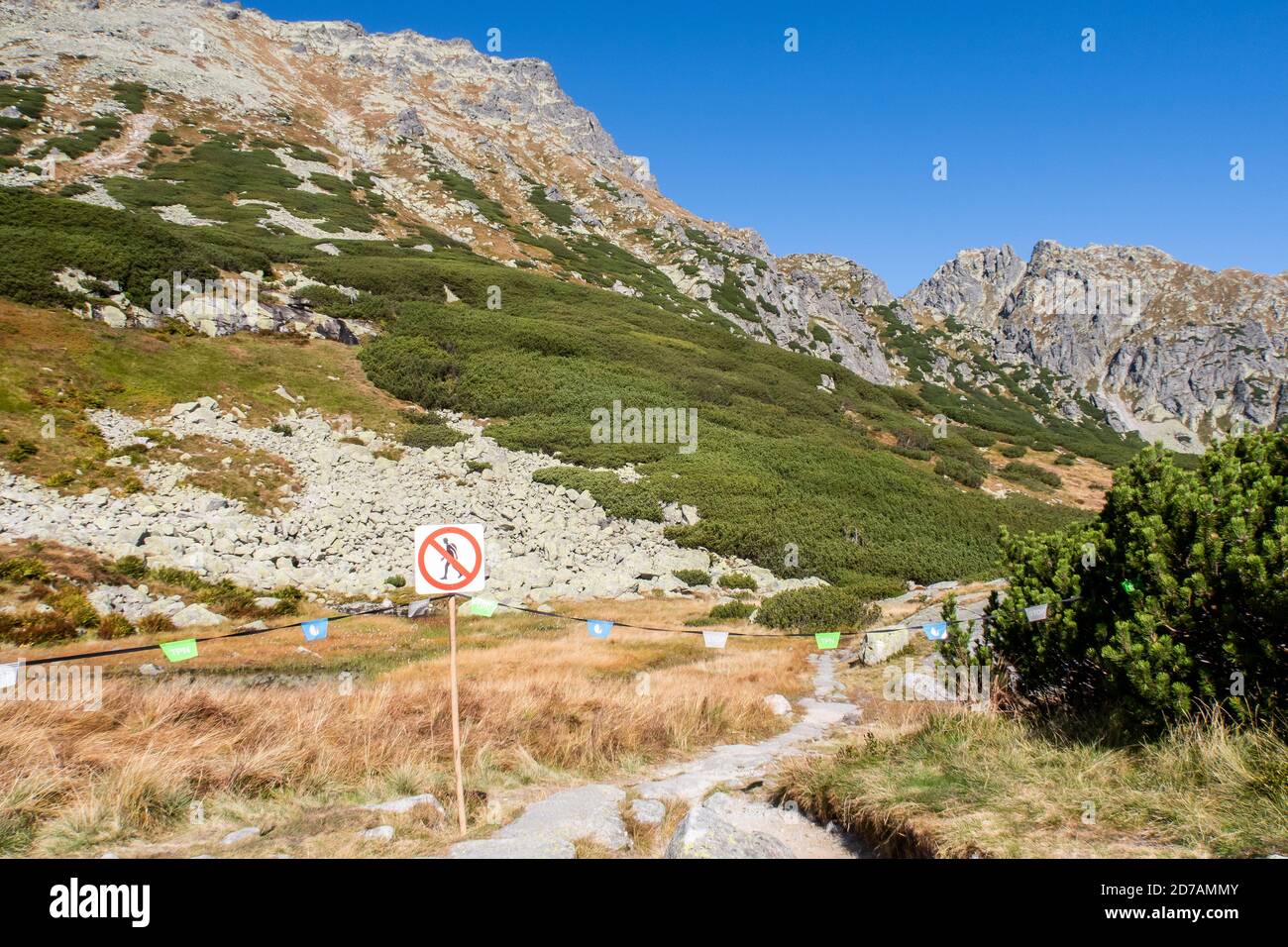 Tatra Mountains, Poland, 21/09/2020. Closed mountain trail markings and barricade tapes in Five Polish Ponds Valley in High Tatra Mountains, Poland. Stock Photo
