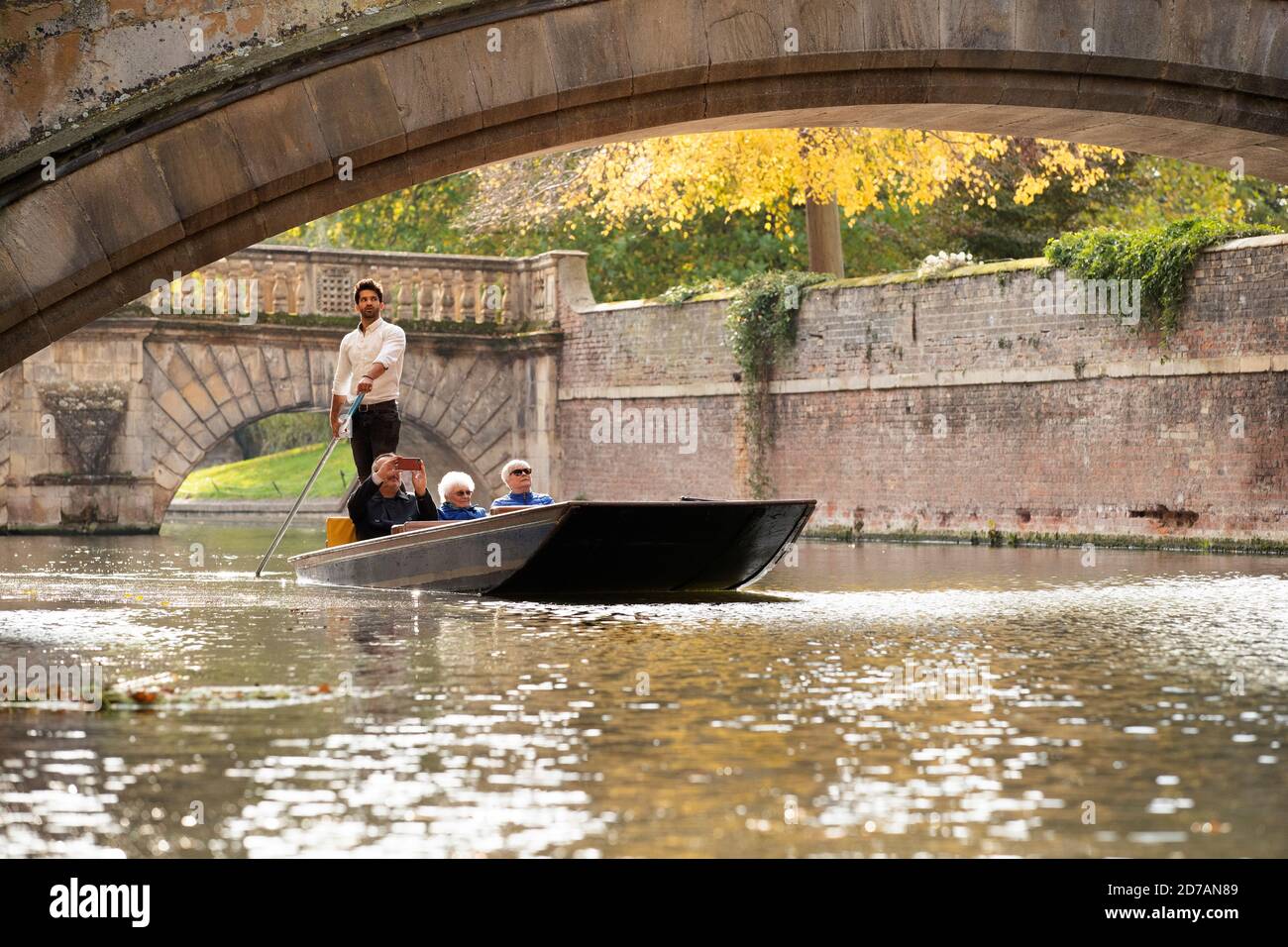 Tourist enjoy a punt along the river Cam in Cambridge. Stock Photo