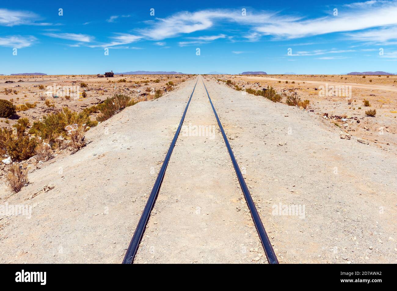 Railway track dissappearing in infinity, Uyuni train cemetery, Bolivia. Stock Photo