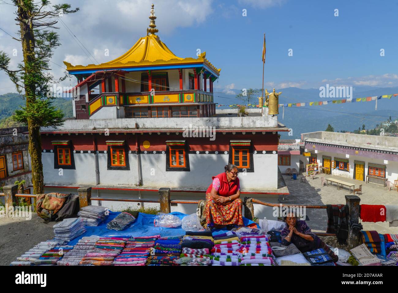 INDIA, DARJEELING, Vendors waiting for tourists in front of the popular Samten Chwoling Stock Photo