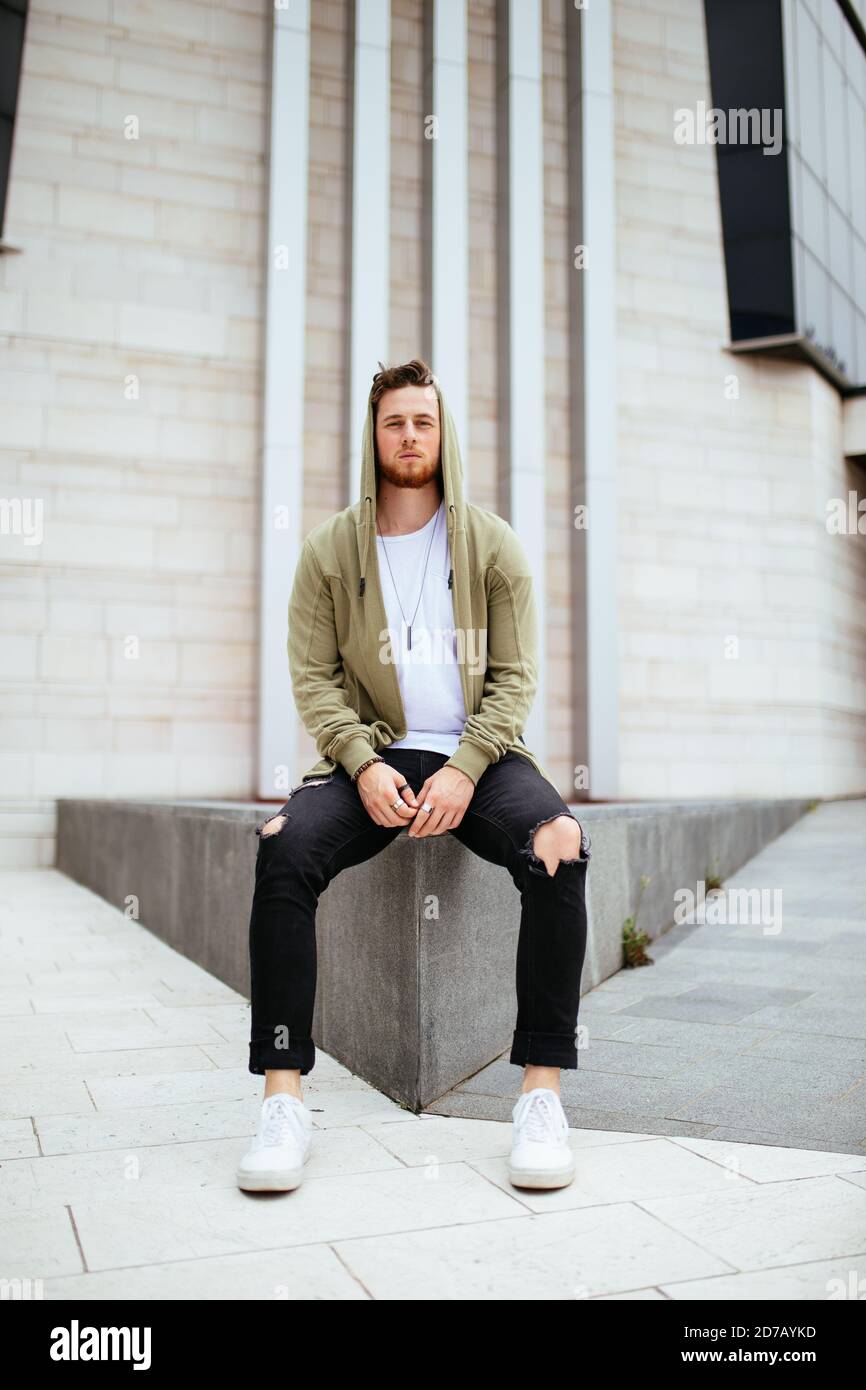 Vertical shot of a handsome young 
