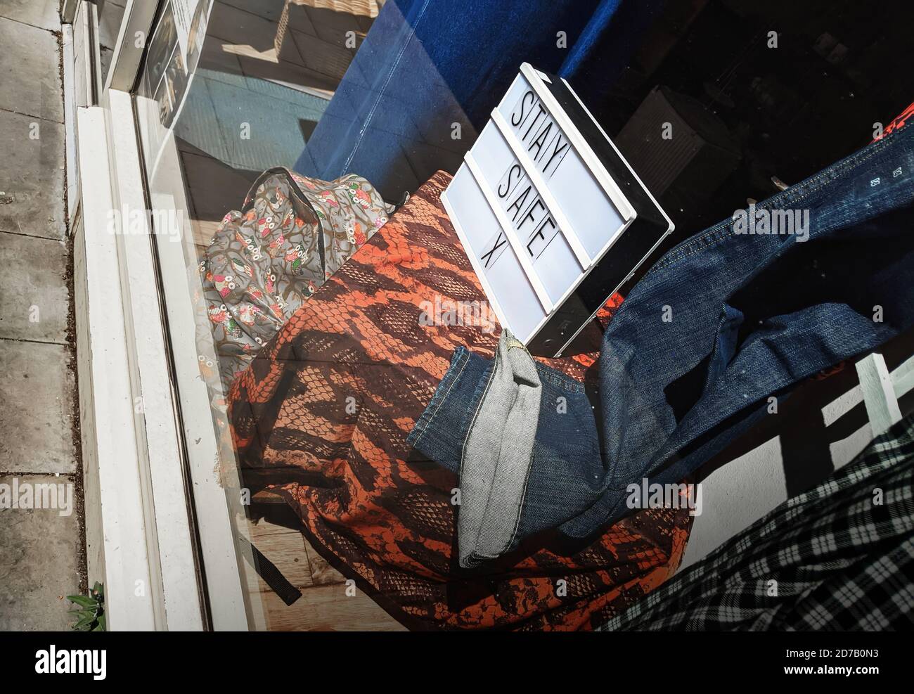Newark On Trent - 20 May 2020 - View of Stay Safe Sign in Shop Display Window during Covid Lockdown in Newark, UK Stock Photo