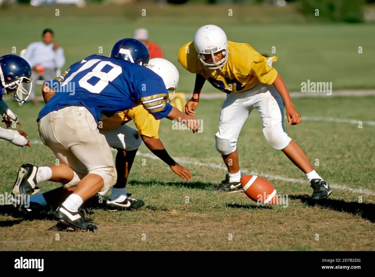Junior varsity high school football action - the ball is fumbled during this play Stock Photo