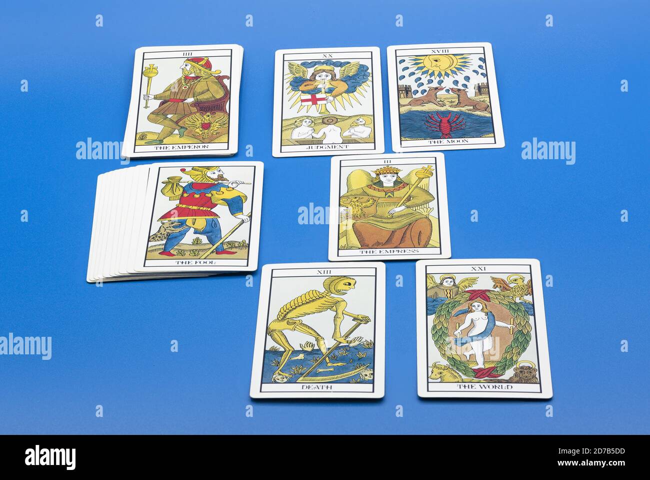 Tarot cards isolated on a blue background Stock Photo