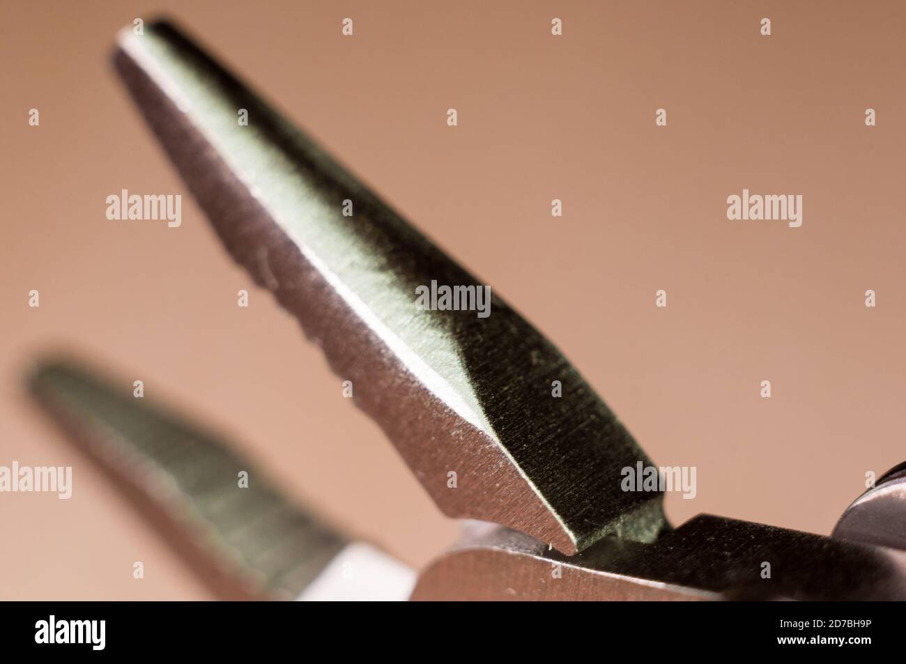 elements small foldable steel multitool, close up, macro Stock Photo