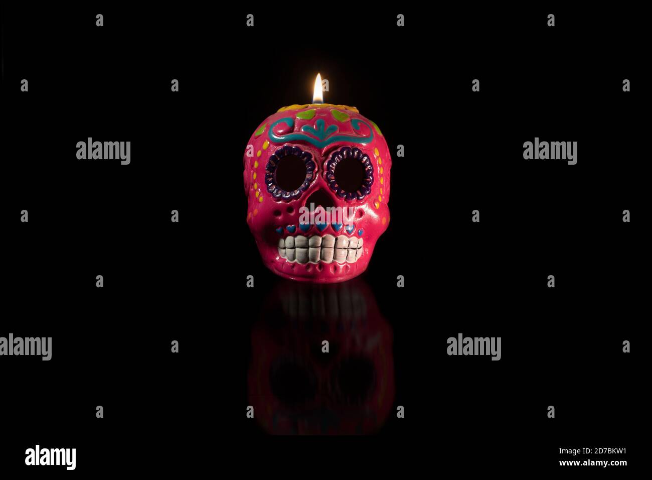 Skull for the offering of the day of the dead with candle on the head Stock Photo