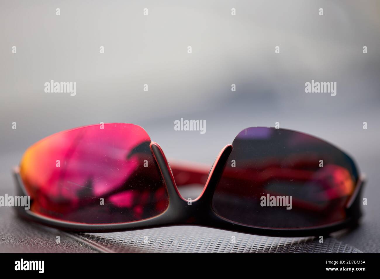 Polarizing sunglasses on a car deck Stock Photo