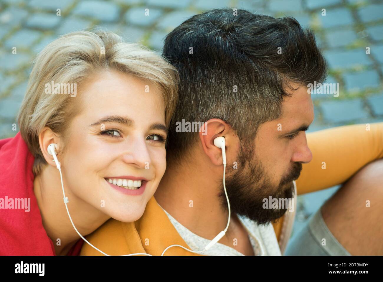 Man and woman modern clothes for youth relaxing outdoors. Couple hang out together. Youth just want have fun. Freedom feeling. Forever young. Youth Stock Photo