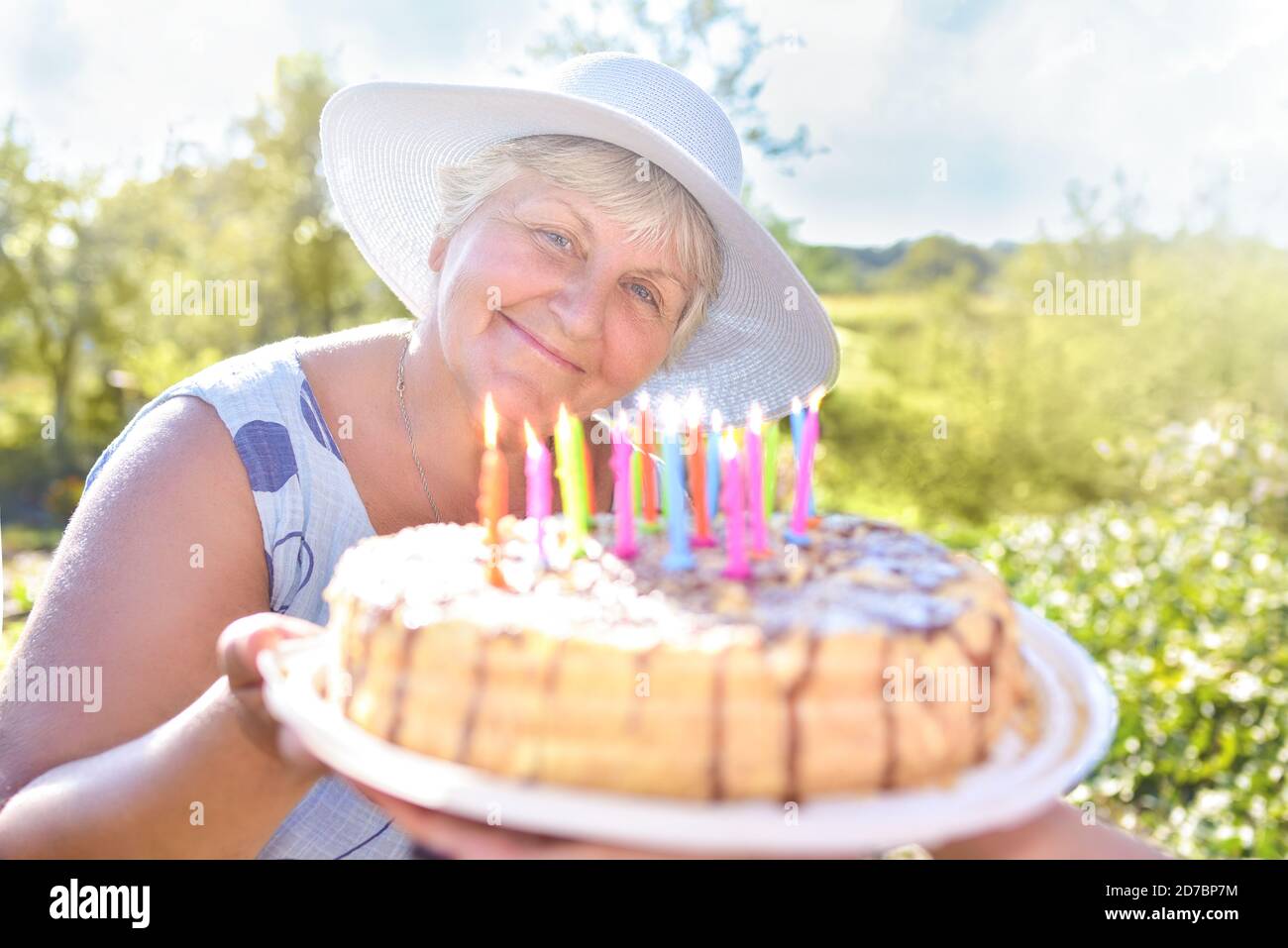 Family celebrating grandmother's birthday together. Love for mom. Happy Mothers Day Stock Photo