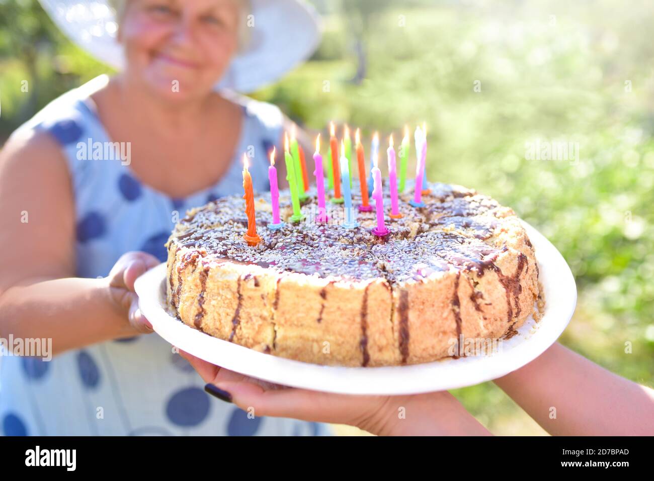 Family celebrating grandmother's birthday together. Love for mom. Happy Mothers Day. happy birthday Stock Photo