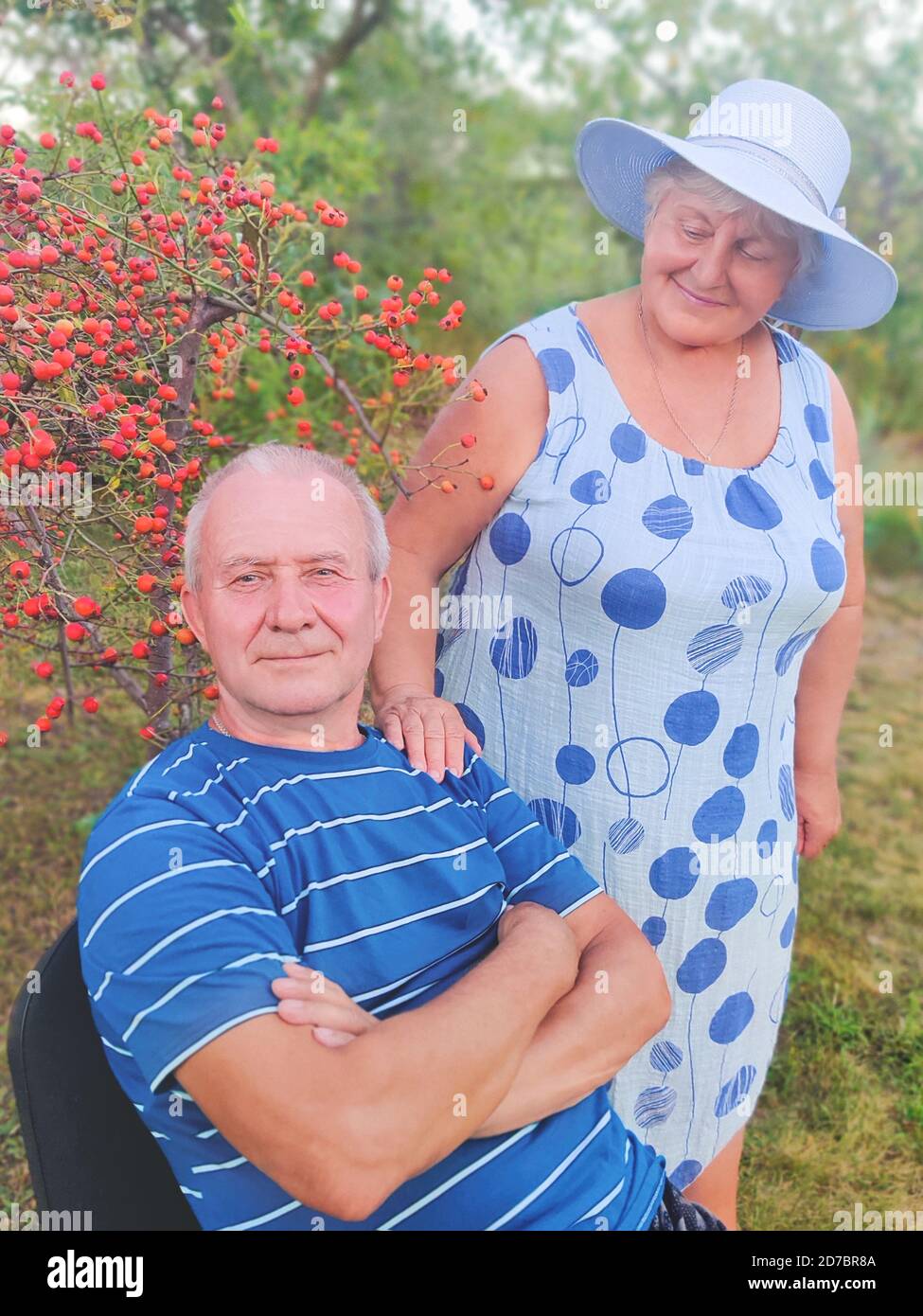 Happy senior couple enjoying each other in the park. Support and care from a loved one Stock Photo