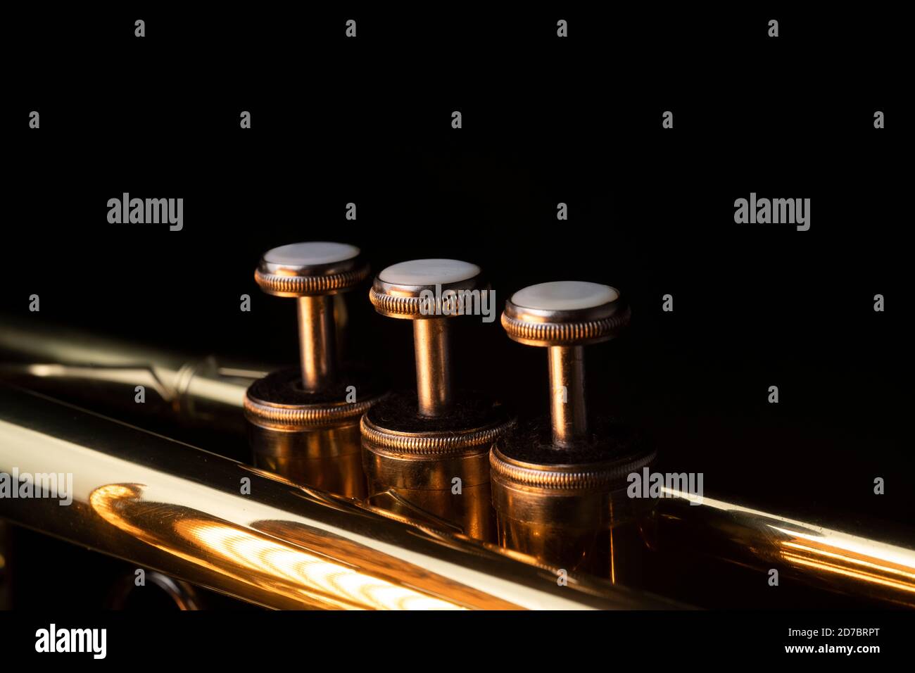 Brass instruments, golden trumpet in the dark Stock Photo Alamy